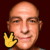 man's face behind a spock-hand indicating live long and prosper